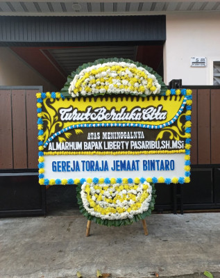 Papan Bunga Duka di Dander